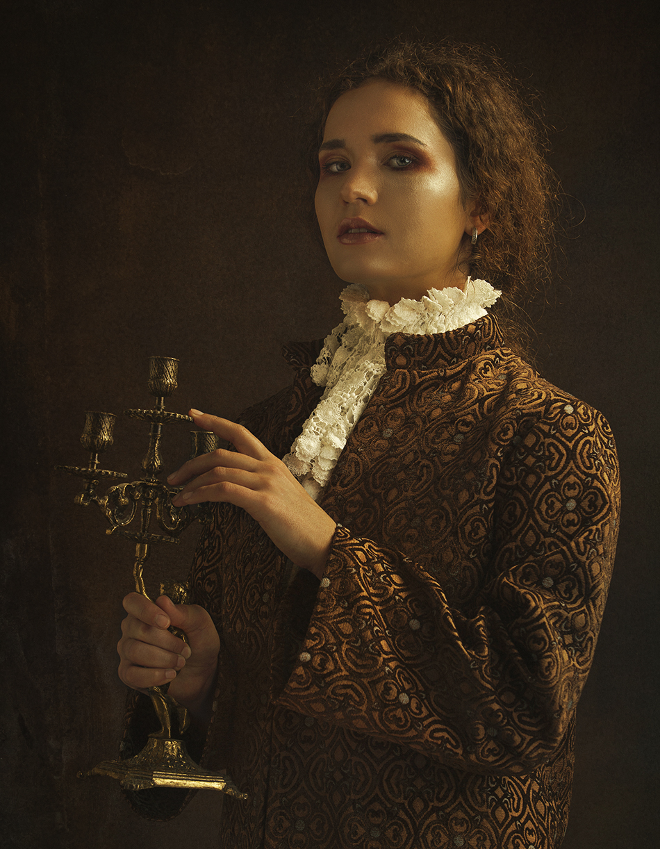 Ksenia looking for a candle
